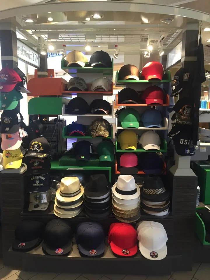 Wall of caps in every color at the MSE kiosk