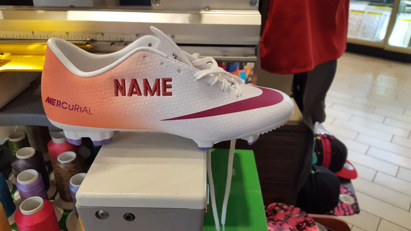 Soccer cleat customized with a name
